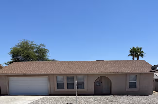 property at 11269 E 27th St